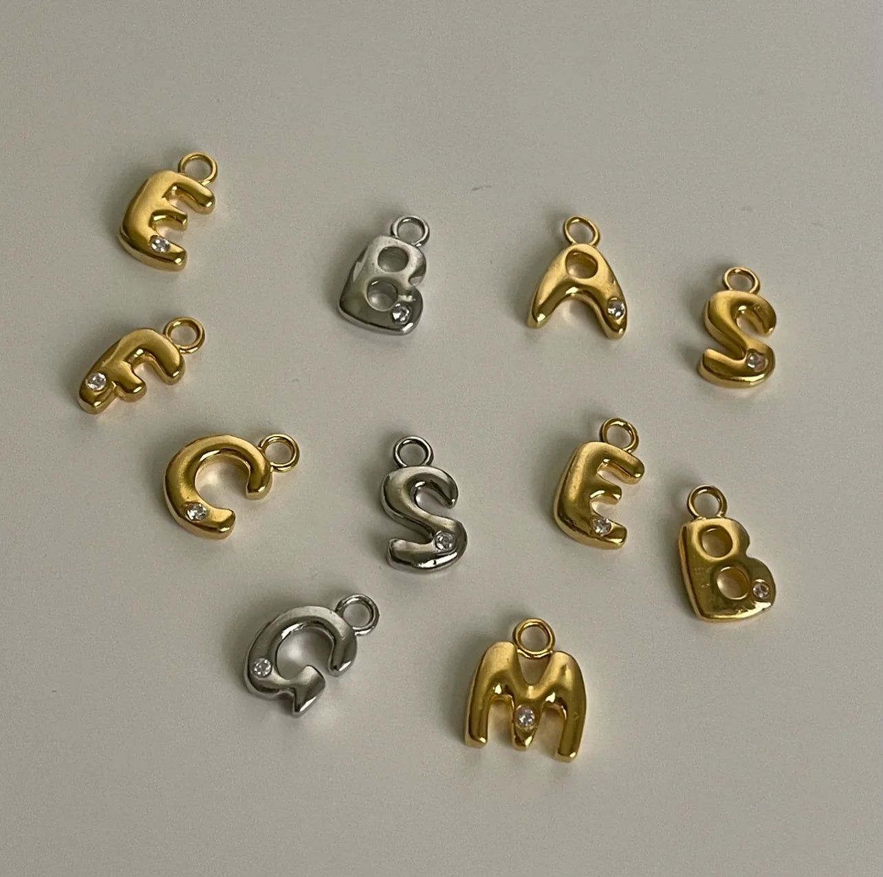 Zircon studded Initials
