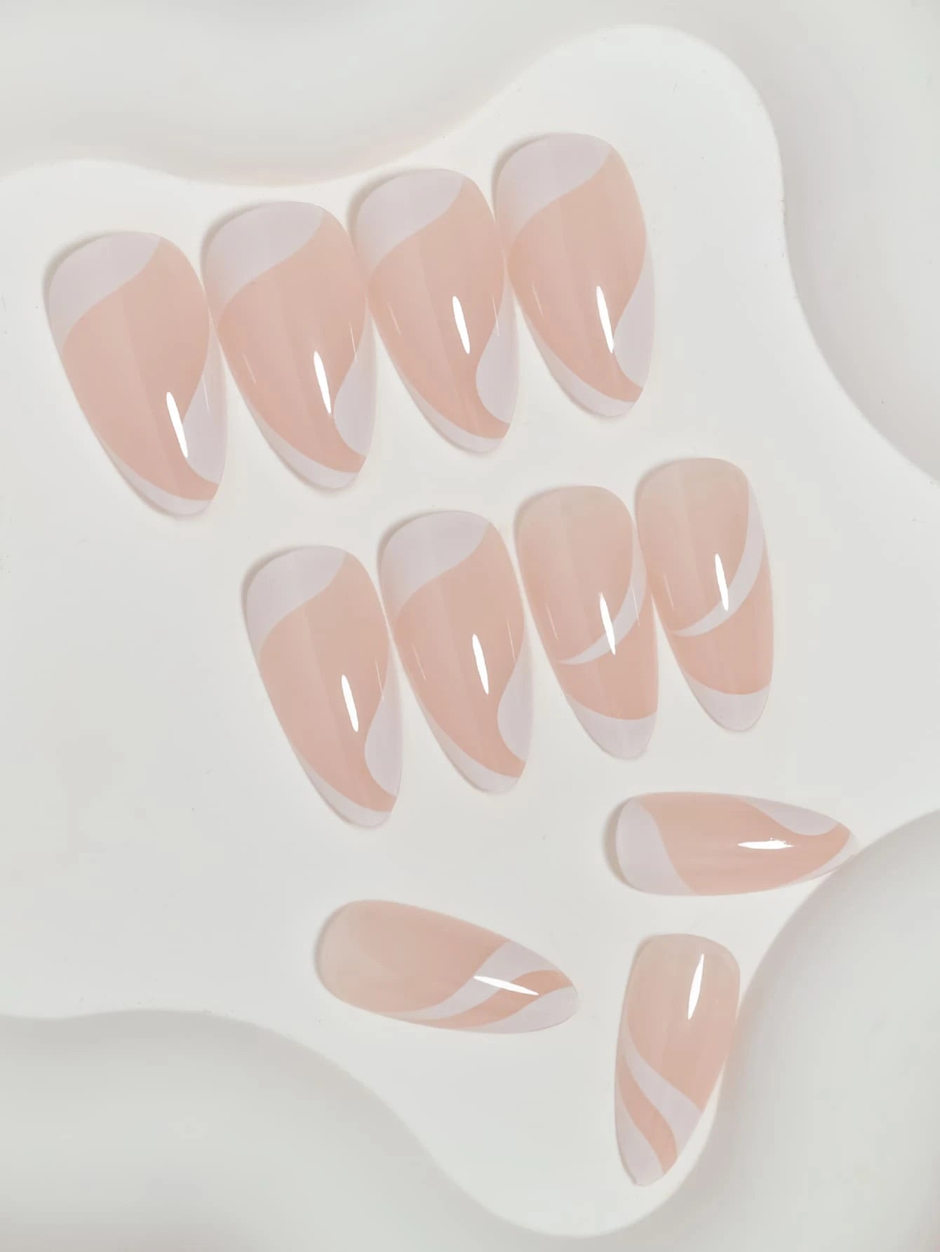 White & pink curve nails
